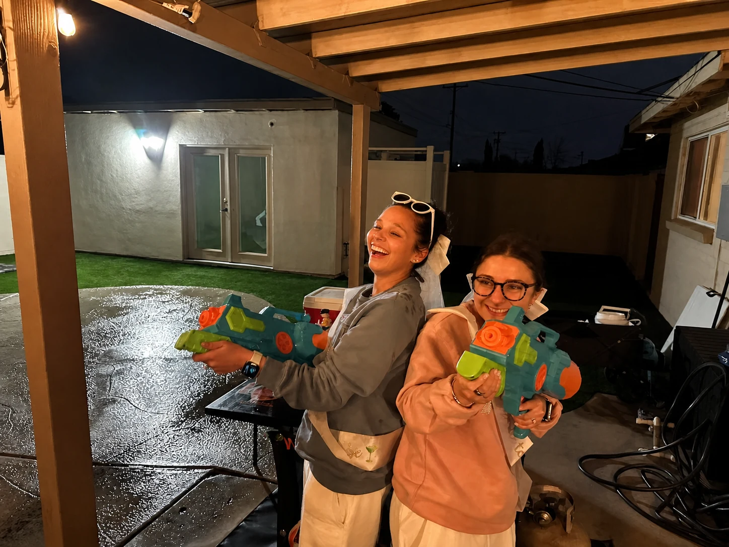 Guests enjoying an interactive hibachi party in rainy weather