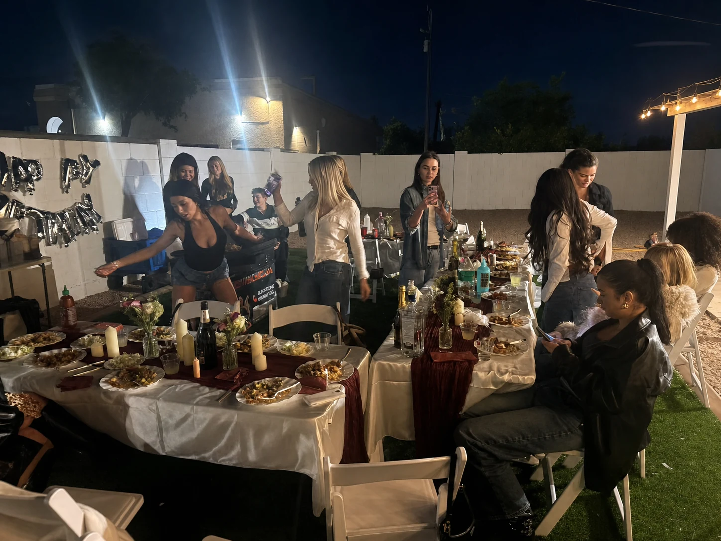 Nighttime hibachi dinner setup after guests finish their meal